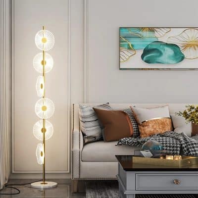 Floor lamp with modern floral design, white and gold decorative lighting for living room decor.