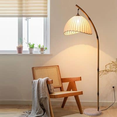 New-floor-lamp-with-wooden-stand-in-cozy-room-for-reading.