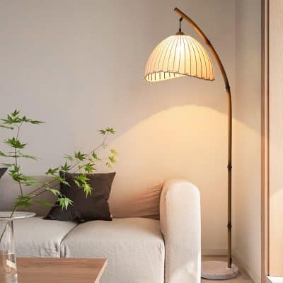 Floor lamp with warm lighting for living room decor, cozy Scandinavian style interior, Monalisa Store.