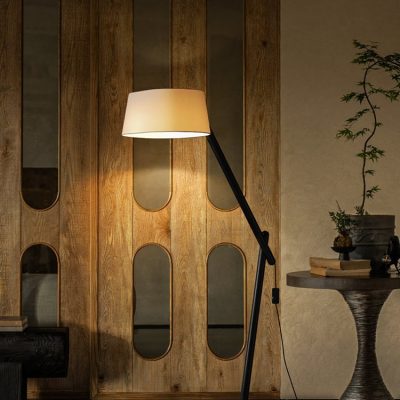 Modern floor lamp with adjustable arm in a stylish interior setting for Monalisa Medical Store.