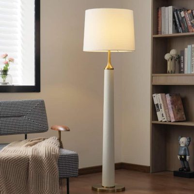 Elegant modern floor lamp with a white and gold finish, ideal for living rooms or reading corners, enhancing home decor with stylish lighting.