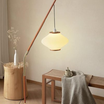 Modern minimalist interior decor with warm lighting, cozy furnishings, and elegant design elements suitable for optometry or optical retail space.