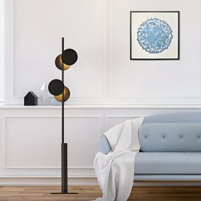 Contemporary living room with modern floor lamp, minimalist wall art, and elegant light blue sofa, showcasing stylish home decor ideas and interior design inspirations.
