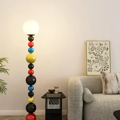 Colorful modern floor lamp with spherical design in a cozy living room setting.
