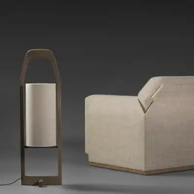 Modern beige sofa with sleek design and textured fabric for stylish comfort in living spaces.