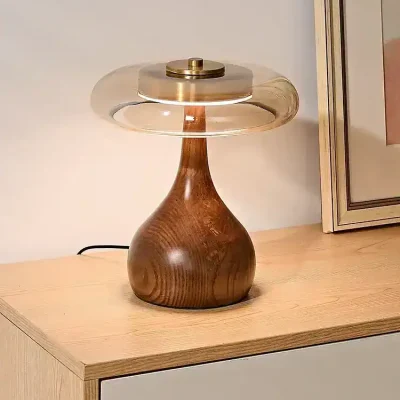 Elegant wooden and glass table lamp with modern design, ideal for sophisticated home decor, offering ambient lighting for living rooms or bedrooms.