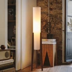Elegant modern floor lamp with warm lighting, perfect for stylish interior decor and enhancing visual comfort in a contemporary living space at Monalisa Store.