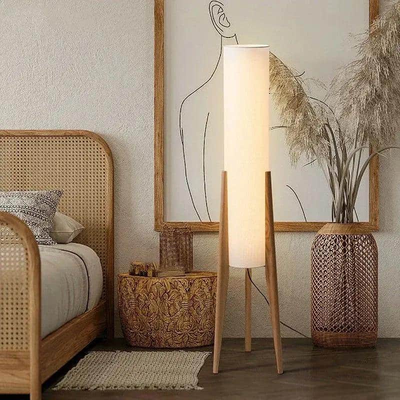 Warm modern bedroom decor with rattan furniture, minimalist art, and bamboo accents for a cozy, stylish space. Perfect for creating a relaxing atmosphere in any bedroom.
