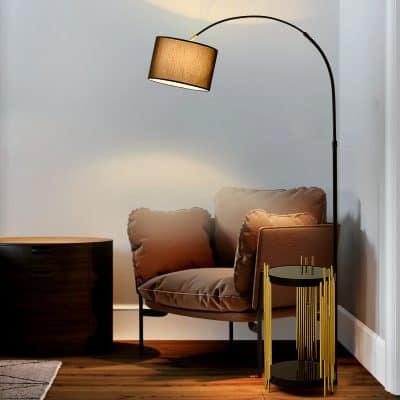 Aesthetic reading nook with beige armchair, modern reading lamp, and stylish side table in cozy corner, perfect for relaxation and indoor comfort.