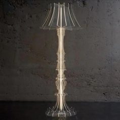Shiny decorative floor lamp with a modern design, perfect for stylish home or office lighting. Ideal for enhancing interior decor with elegant lighting solutions.