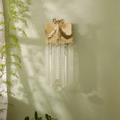 Elegant crystal and gold chandelier with ornate details, perfect for luxurious interiors or opt for stylish home decor. Enhance your space's sophistication with this exquisite hanging light fixture.