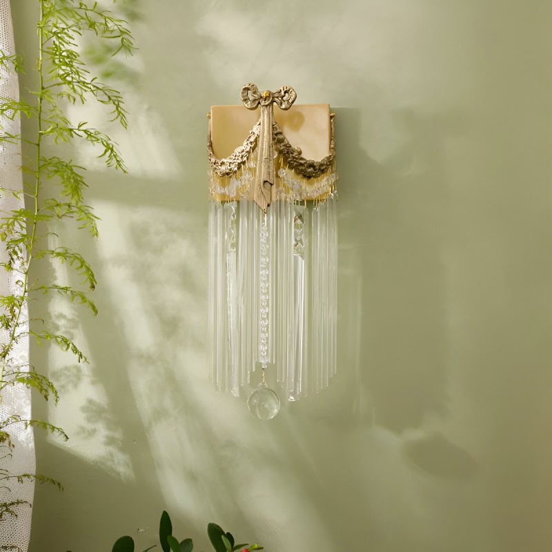 Elegant crystal and gold chandelier with ornate details, perfect for luxurious interiors or opt for stylish home decor. Enhance your space's sophistication with this exquisite hanging light fixture.