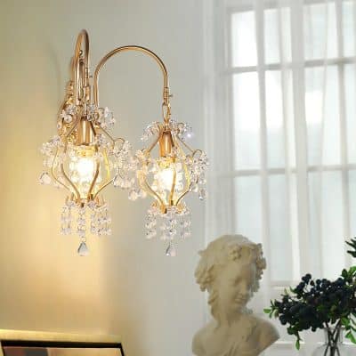 Elegant gold and crystal chandelier lighting fixture at Monalisa Store, perfect for upscale interiors and luxury eye care clinics.