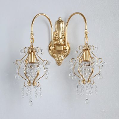 Elegant gold wall-mounted chandelier with crystal accents, perfect for luxurious interior decor and lighting solutions. Ideal for enhancing home or office ambiance with sophisticated style.