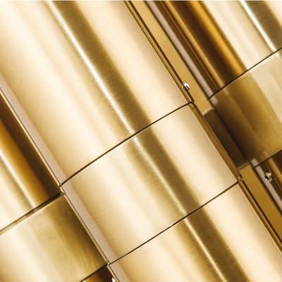 Gold-colored metallic containers for storage or display, with a sleek and modern design suitable for a high-end optometry or eyewear store like Monalisa Store, emphasizing luxury and quality in optical accessories.