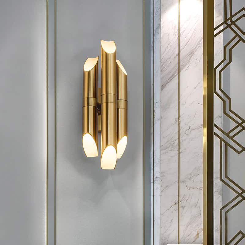 Elegant gold wall sconce with modern design, ideal for luxury interior decor, enhancing any space with ambient lighting and stylish aesthetic.