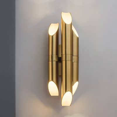 Elegant gold wall sconce lighting fixture, modern design, perfect for residential or commercial spaces, enhances interior decor with stylish illumination.