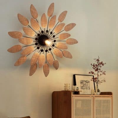 Bright modern ceiling light fixture with leaf-shaped rattan shades in a stylish living room. Perfect for enhancing interior decor and adding warm ambient lighting to your space.