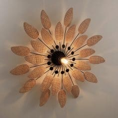 Vintage-inspired woven rattan ceiling light fixture, modern Scandinavian design, perfect for living rooms and bedrooms, energy-efficient LED bulb included.