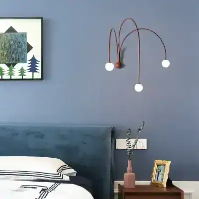 Modern bedroom with stylish lighting fixture and artwork for a contemporary bedroom decor. Featuring a cozy bed, minimalist decor, and elegant lighting perfect to enhance your sleep space.
