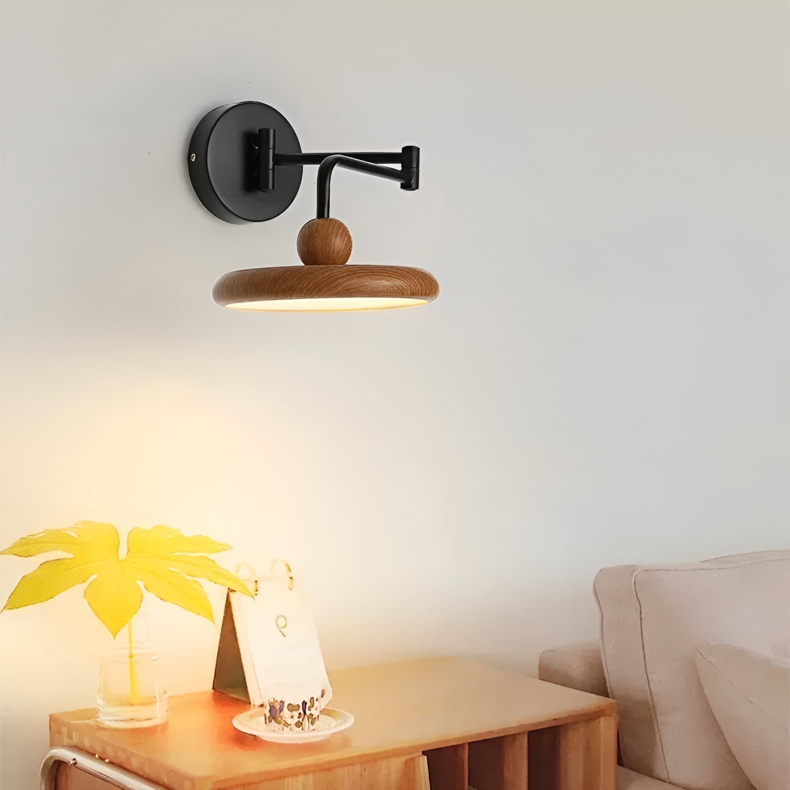 Modern wall-mounted wooden and black metal LED reading lamp in a contemporary living room. Perfect for stylish interior lighting in bedrooms, offices, or reading nooks.