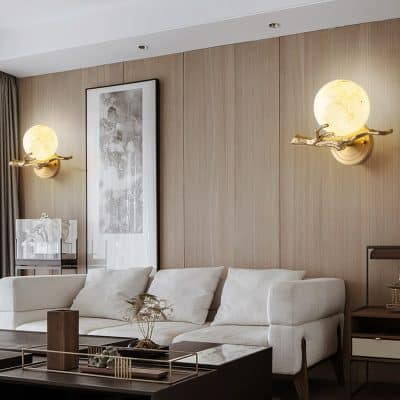 Luxury interior living room with modern wall sconces and minimalist decor, illustrating elegant home design and comfortable ambiance.