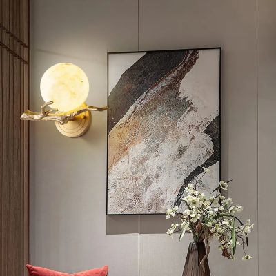 Elegant modern interior décor with contemporary wall art, unique lighting fixture, and a stylish flower arrangement, perfect for an optometry or eyewear store ambiance.