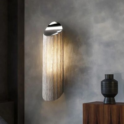 Luxury modern wall light with metallic chain design, decorative interior lighting fixture for home or office decor.