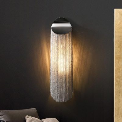 Shiny modern wall sconce with cascading chain design, black circular top, and warm lighting, perfect for contemporary interior decor in opt clinics or stylish spaces.