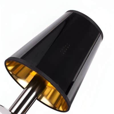 High-tech black and gold LED skincare and beauty device for facial treatments, with sleek modern design, ideal for professional and home use for radiant skin enhancement.