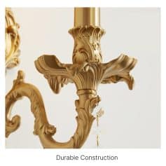 Gold ornamental wall sconce with intricate carved details, durable construction, ideal for enhancing luxury interior decor, available at Monalisa Store for elegant lighting fixtures.