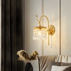 Elegant gold and crystal wall sconce lighting fixture perfect for luxury interior decor at Monalisa Store.