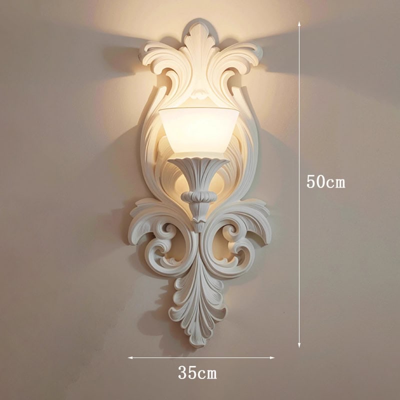 Ornate white wall sconce light fixture with detailed scrollwork, 50cm height and 35cm width, perfect for elegant interior lighting décor.