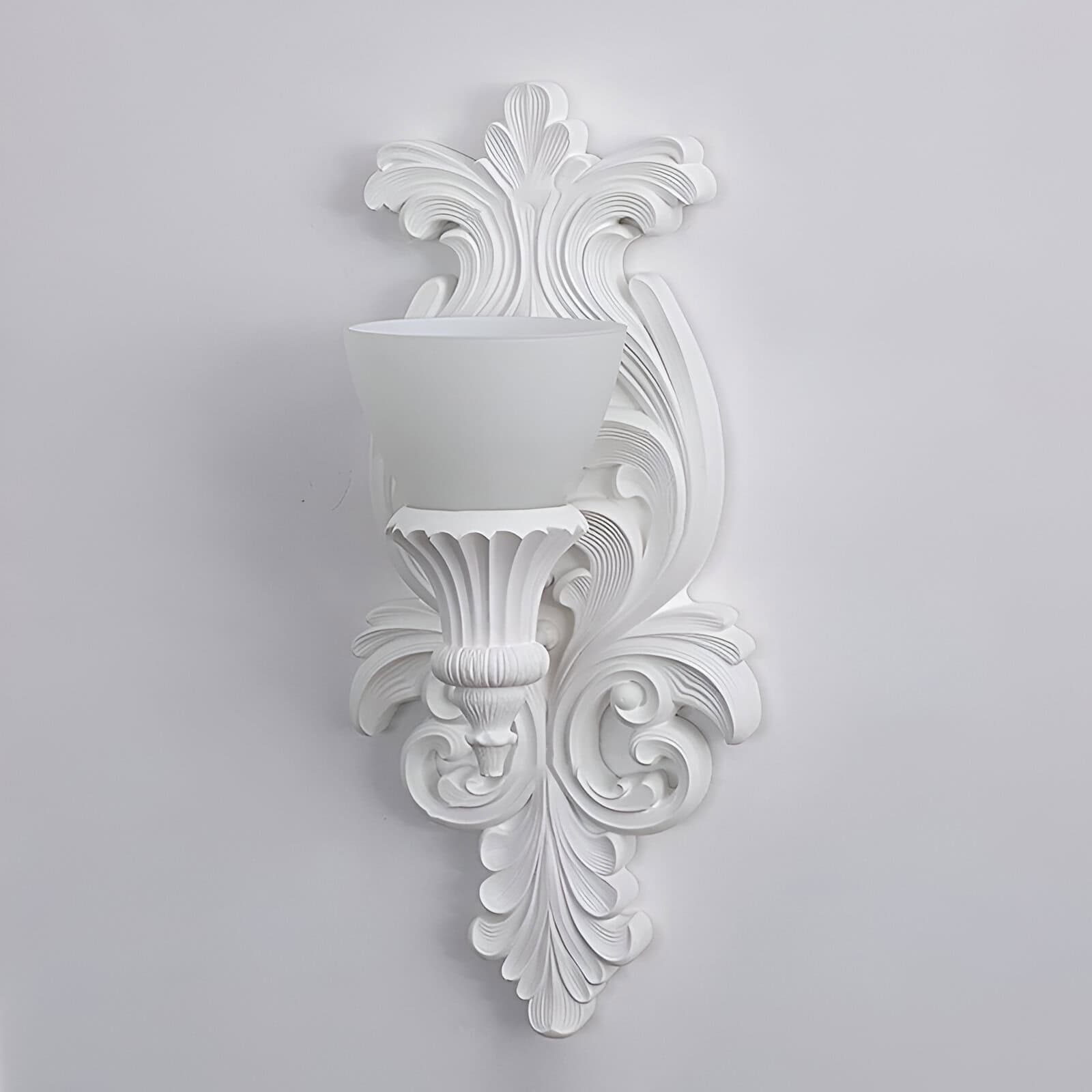 Ornate white wall sconce with intricate Baroque-style detailing, perfect for elegant interior decorating and enhancing luxury home decor.