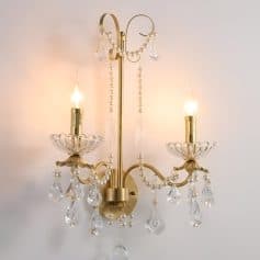 Elegant gold and crystal chandelier with pearl accents, perfect for sophisticated home decor and interior lighting. Ideal for enhancing living rooms, bedrooms, or dining areas.
