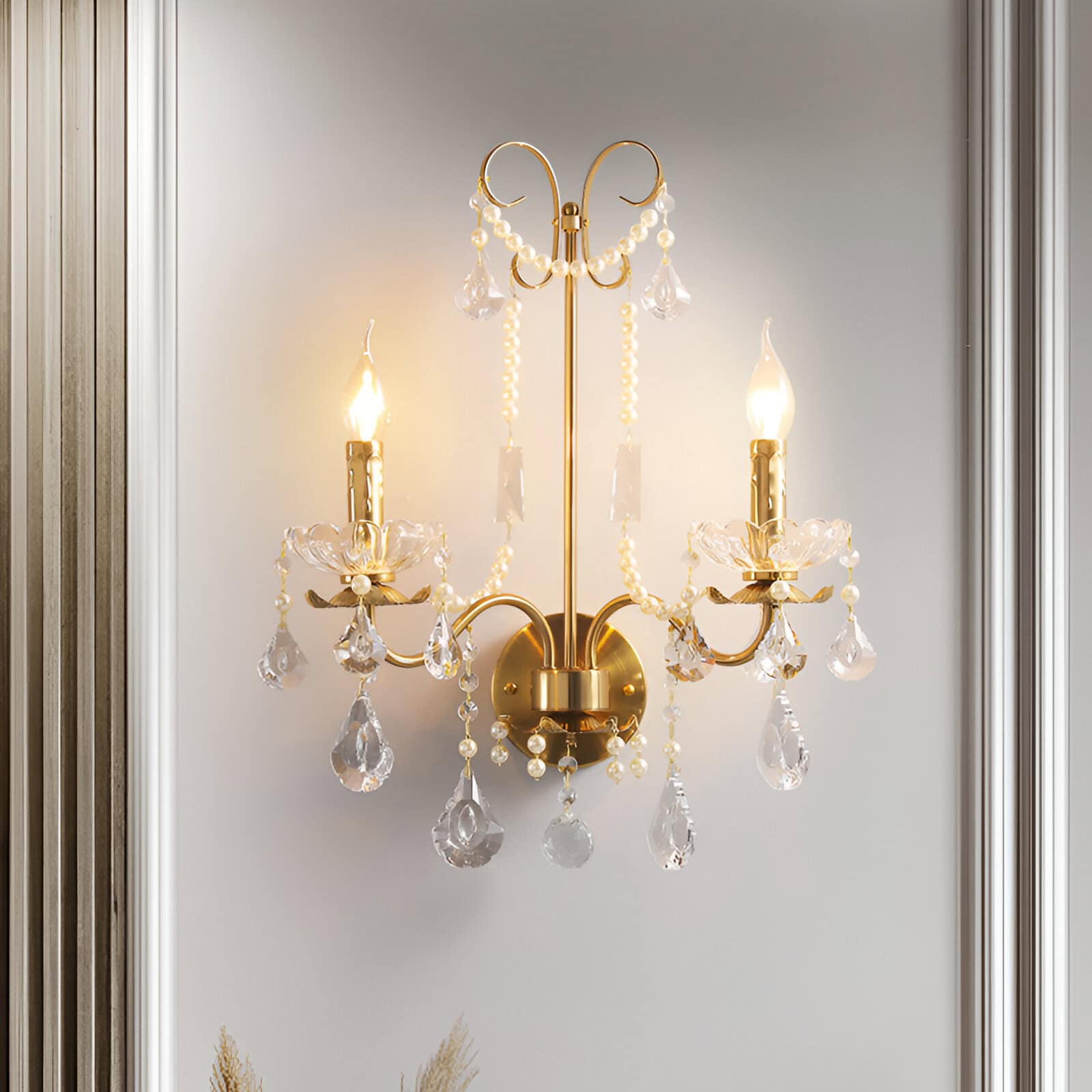 Elegant gold and crystal wall sconce chandelier with LED candles, decorative beads, and dangling crystal accents, perfect for luxurious interior lighting.