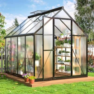 Metal and glass greenhouse for gardening and plant care, designed by Monalisa Store with durable frame and transparent panels. Ideal for home gardening, plant cultivation, and botanical enthusiasts.