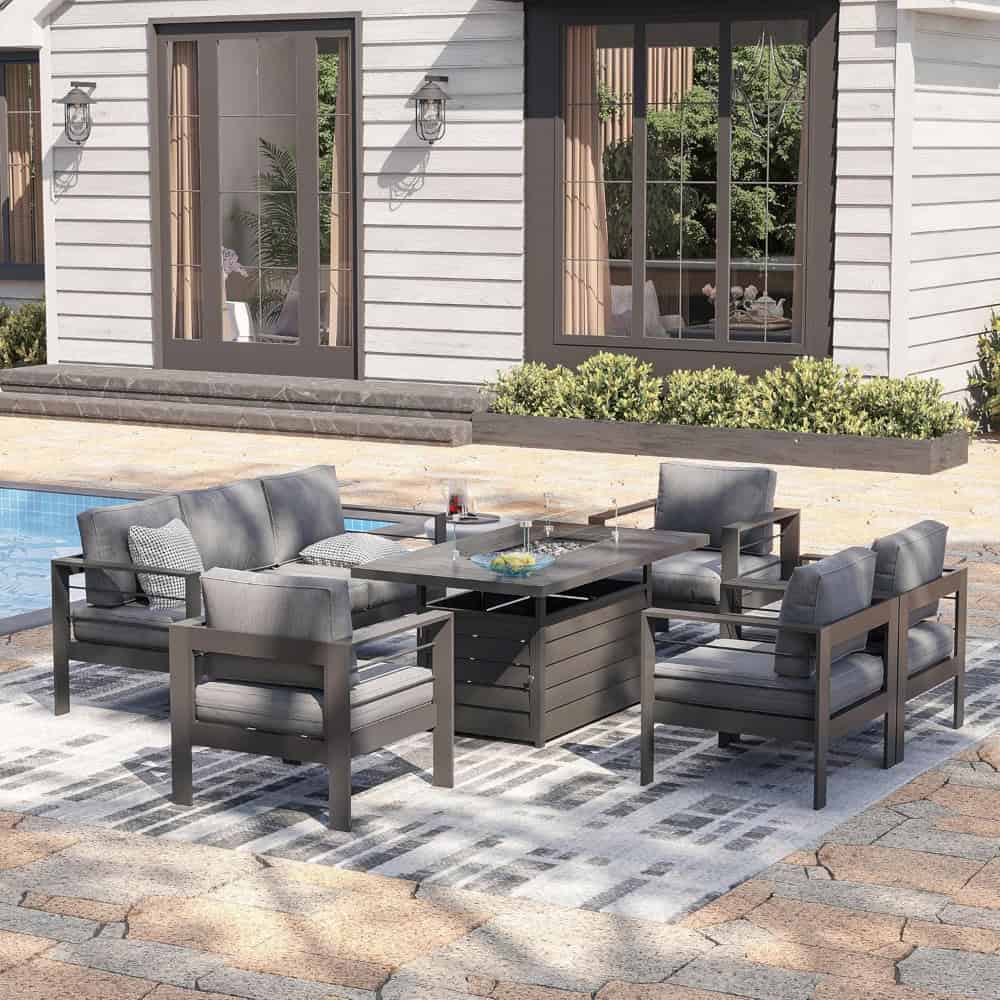 Stylish outdoor patio furniture set with gray cushions and weather-resistant frame, perfect for garden or poolside relaxation.