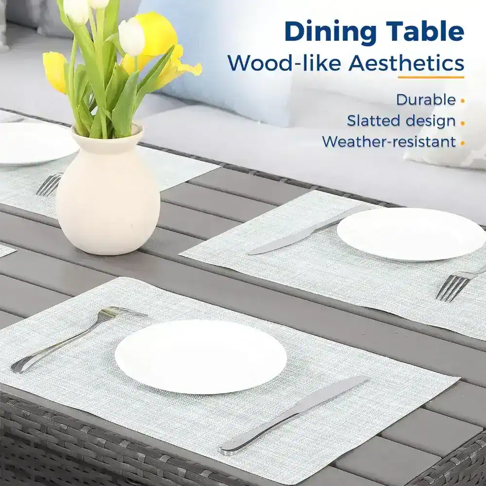Elegant wood-like dining table with sleek slatted design, weather-resistant surface, ideal for modern home decor and outdoor dining spaces. Perfect blend of durability and aesthetic appeal.