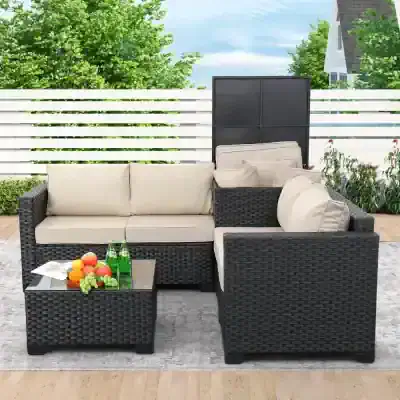 Luxury outdoor wicker sectional sofa set with beige cushions, perfect for garden patio seating and relaxation. Includes a matching coffee table with fresh fruit and drinks.
