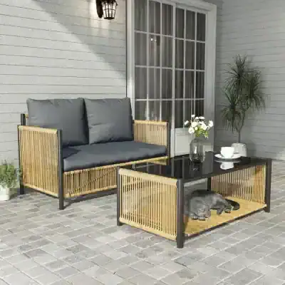 Modern outdoor furniture set with rattan accents and grey cushions, perfect for garden or patio relaxation.