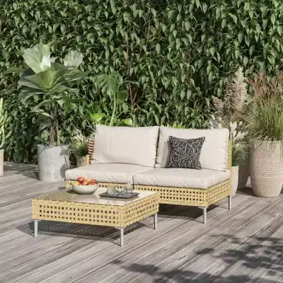 Elegant outdoor rattan sofa set with plush cushions and decorative pillows, ideal for garden or patio relaxation, from Monalisa Store’s outdoor furniture collection.
