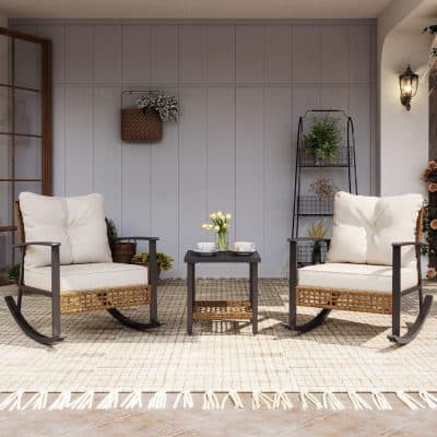 Relaxing outdoor patio with comfortable rattan rocking chairs and a cozy side table, perfect for enjoying sunny days and peaceful moments, emphasizing stylish outdoor furniture from Monalisa Store.