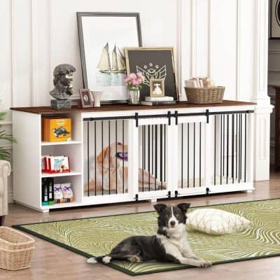 Cozy pet play area with black and white dog inside a white wooden dog crate with black metal bars, set against a decorative shelf with artwork, books, and a flower vase in a stylish living room.