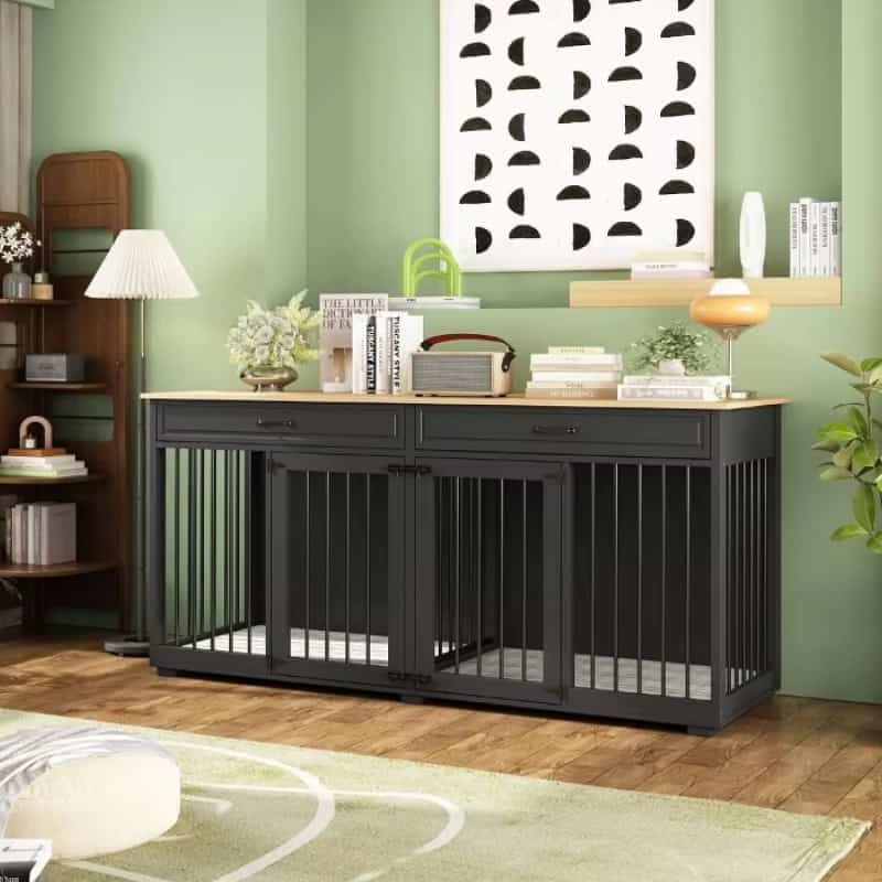 Elegant black pet crate with a light wood top, decorated with books, plants, and stylish decor, in a modern living room setting.