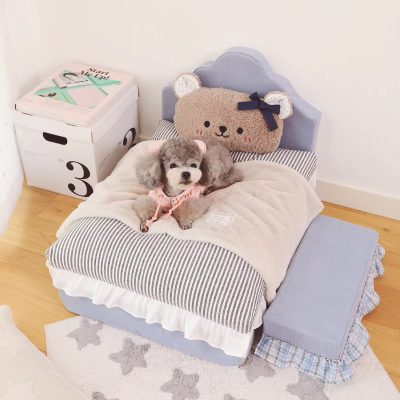 Cute plush puppy on toddler bed with bear pillow, cozy bedding, and soft decor, perfect for a child's room with Monalisa Store children's furniture and bedroom accessories.