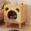 Stylish wooden cat house with cozy interior, designed for pet comfort and modern home decor, perfect for your feline friend.