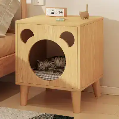 Cozy wooden cat enclosure with playful interior, modern pet furniture, stylish home decor for cats, Monalisa Store pet products, functional and decorative feline furniture, modern design for pet owners, stylish cat furniture ideas, wooden pet house with cutouts, innovative pet furniture for small spaces, wooden cat bed with cute design, modern and functional pet furniture for homes.