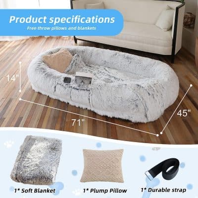 Furry oval pet bed with plush blanket, pillow, and strap, ideal for pet comfort and relaxation.