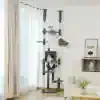 Luxurious multi-level cat tree with cozy hideouts and platforms for indoor cats, showcasing modern home decor with cats relaxing and playing in a bright living room.